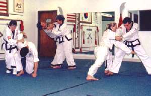 Students practicing self-defense